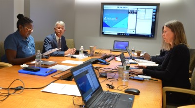 Andrews (left), Beuerlein, and Ackerman prepare for the webinar